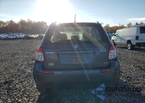 2012 Suzuki Sx4 из США, поврежденный, VIN JS2YB5A33C6304708